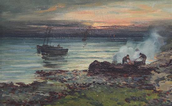 Colin Hunter (1841-1904) Coastal landscape with figures lighting a fire and moored fishing boats, 6 x 10in.